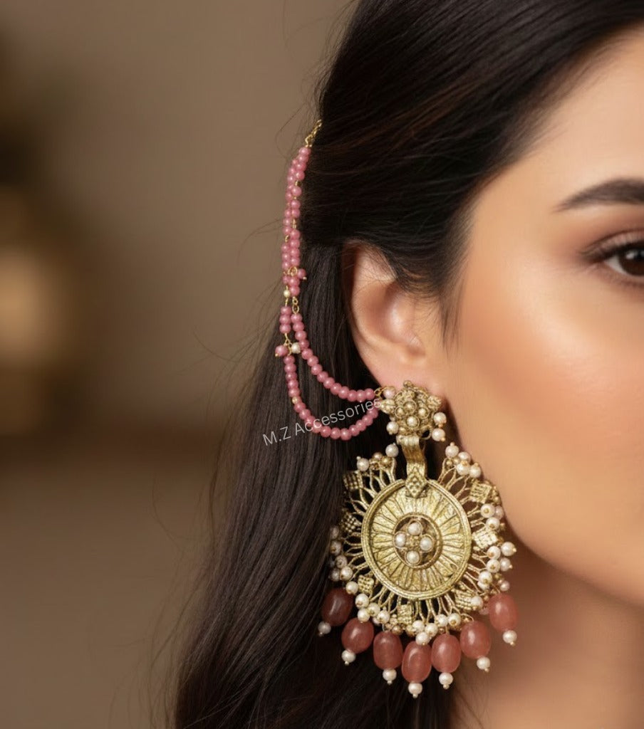 Antique gold plated earrings with pink stones