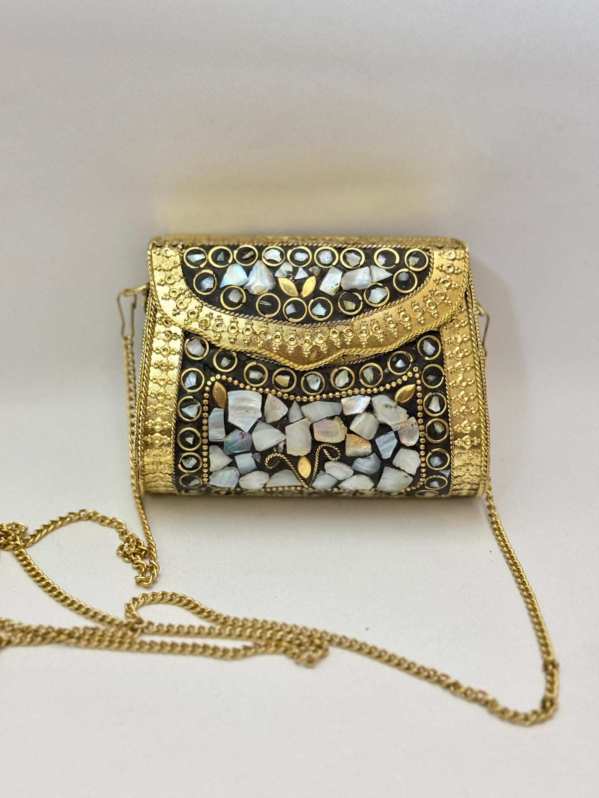Fresh water pearl metal clutch