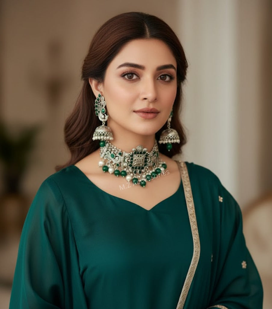 CS-21 Oxidized german silver bird set with emerald stones