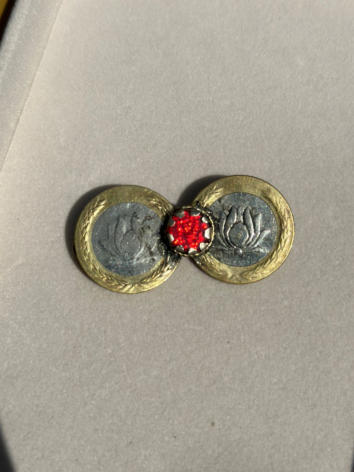 Lotus coin hairpin.