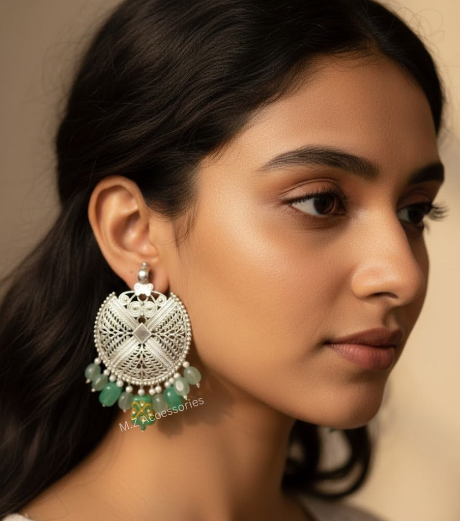 Oxidized pendant earrings with mint color hangings