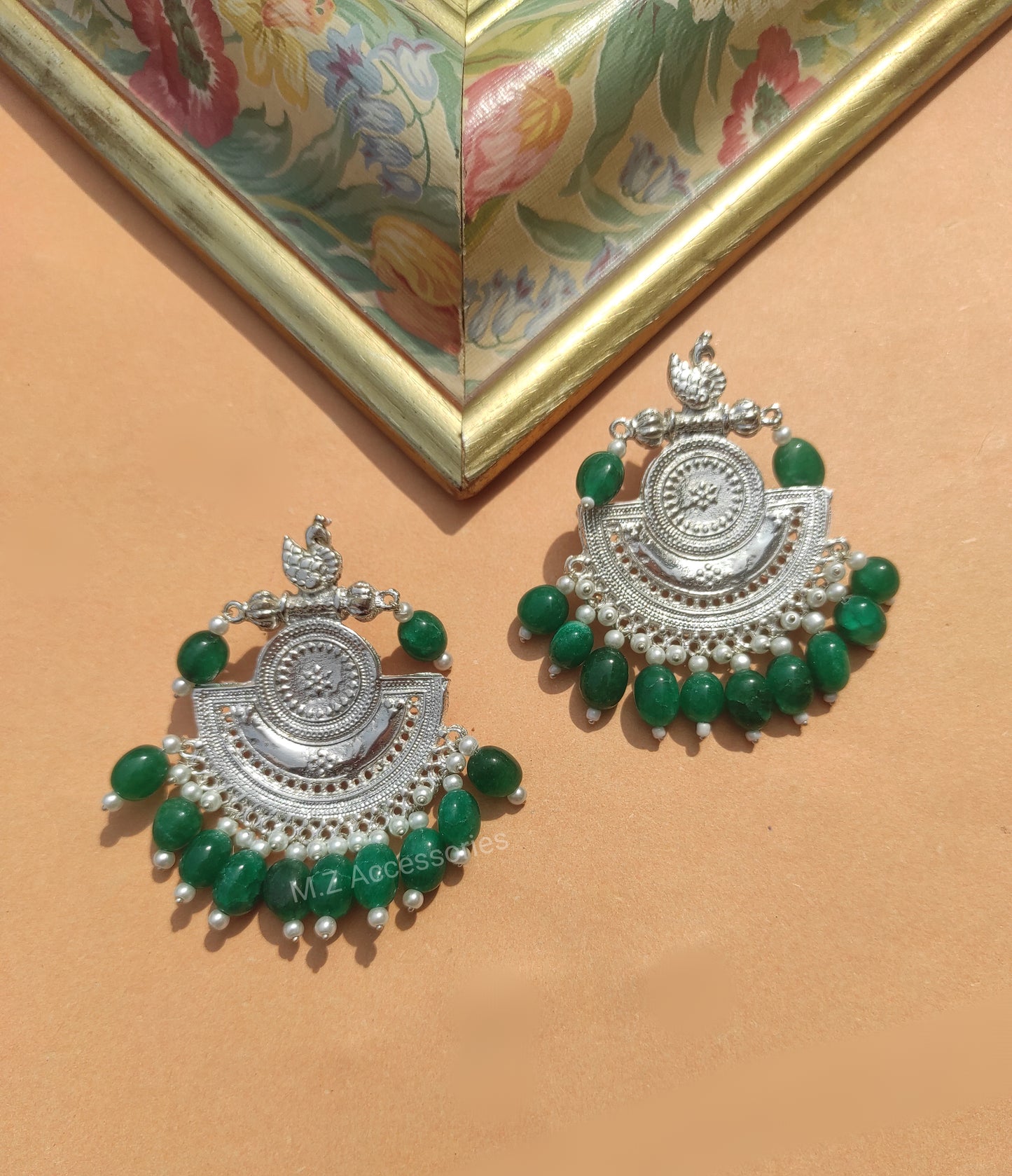 Swan earrings with green hangings