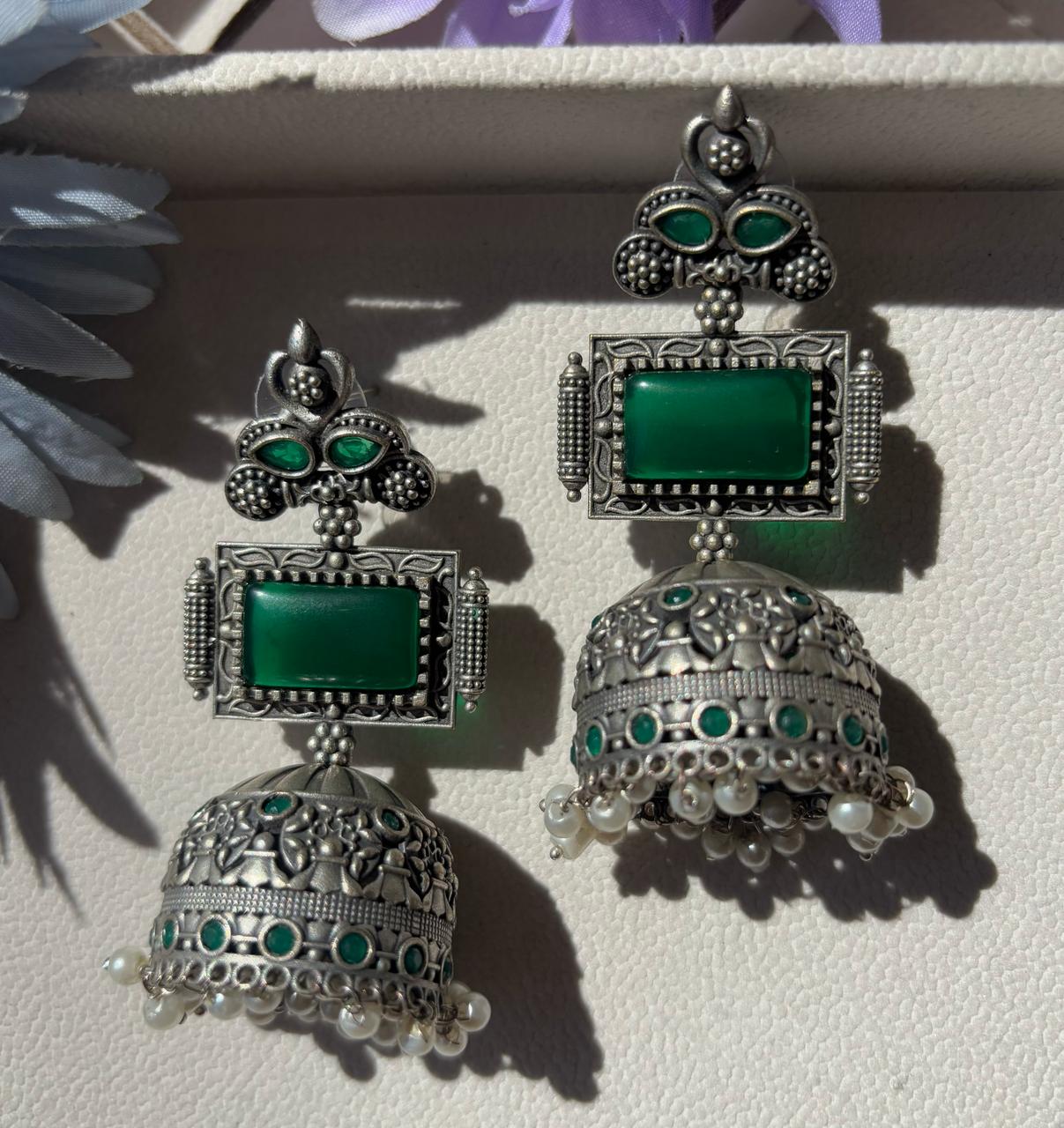 Oxidized German silver long earrings with emerald green stone