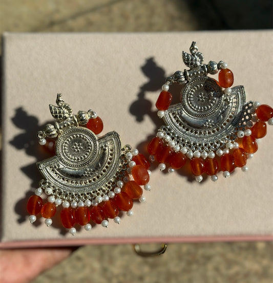 Antique silver swan earrings with orange stone hamgings