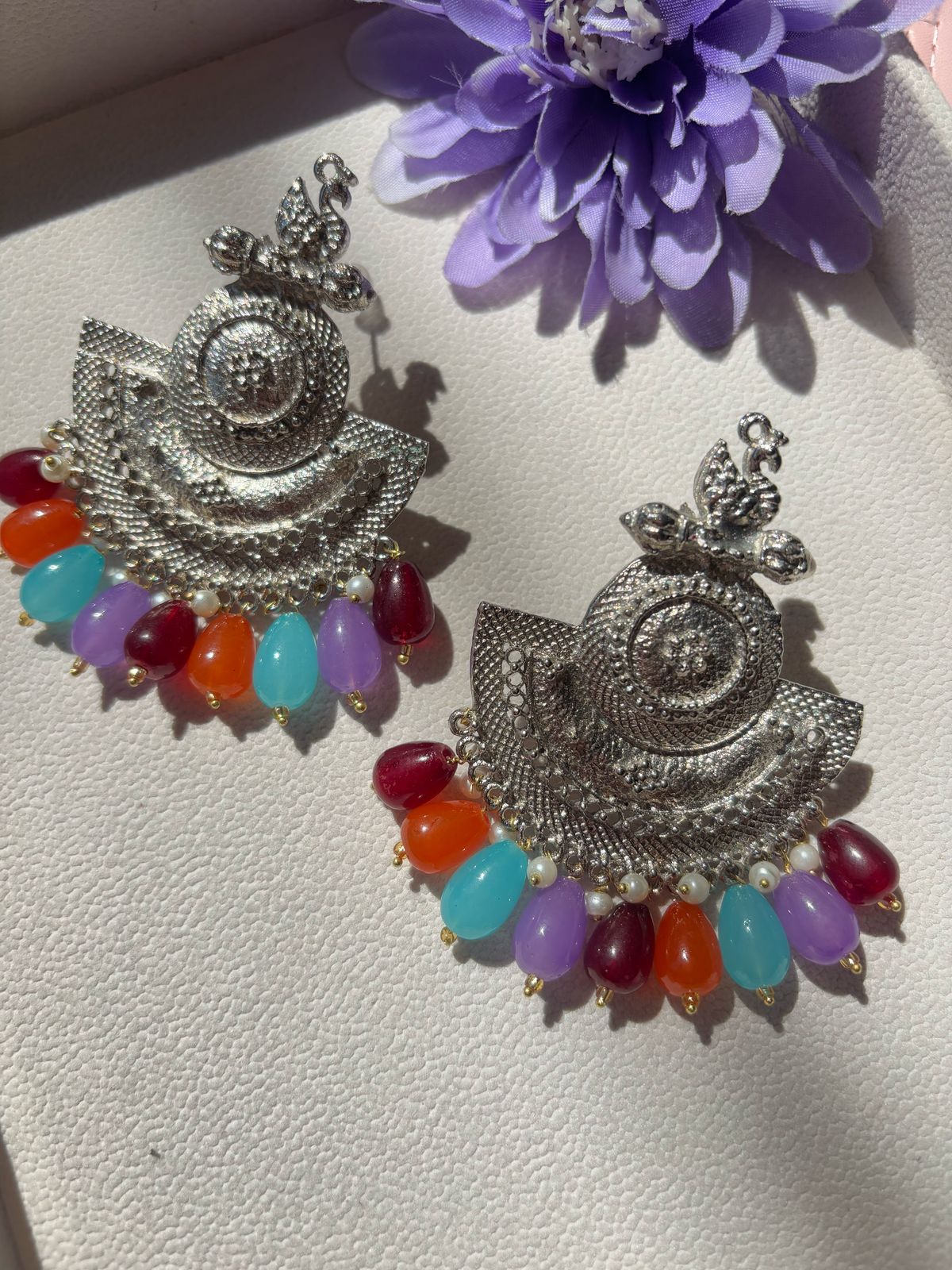 Swan pendant earrings with multi color stone hangings