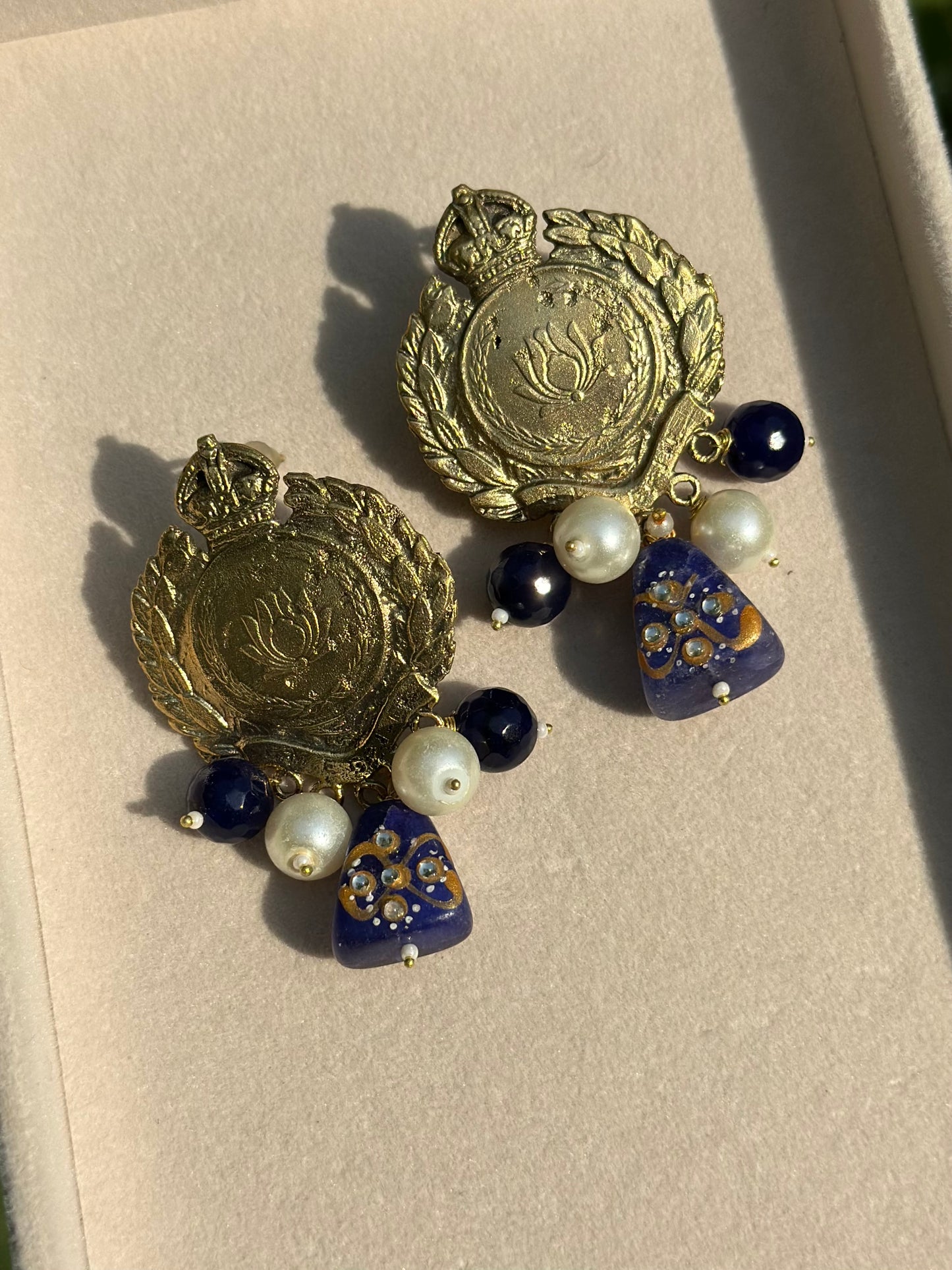 Antique lotus earrings with blue stone hangings