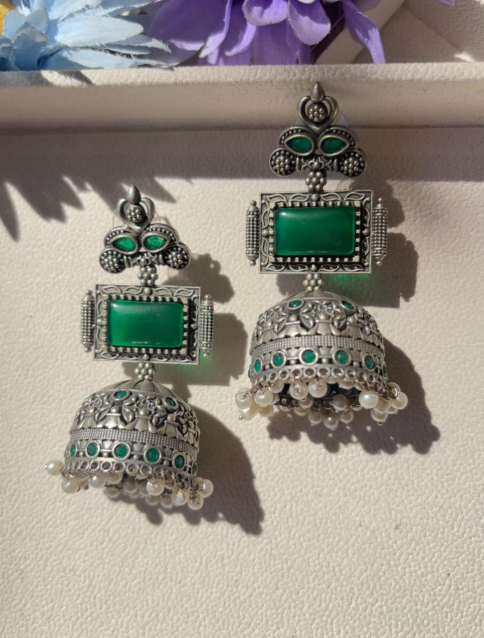 Oxidized German silver long earrings with emerald green stone