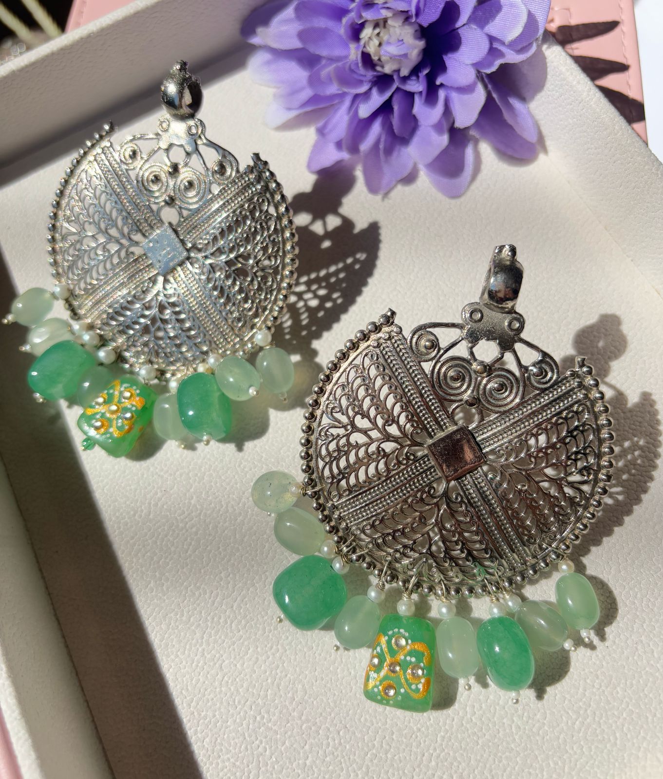 Oxidized pendant earrings with mint color hangings