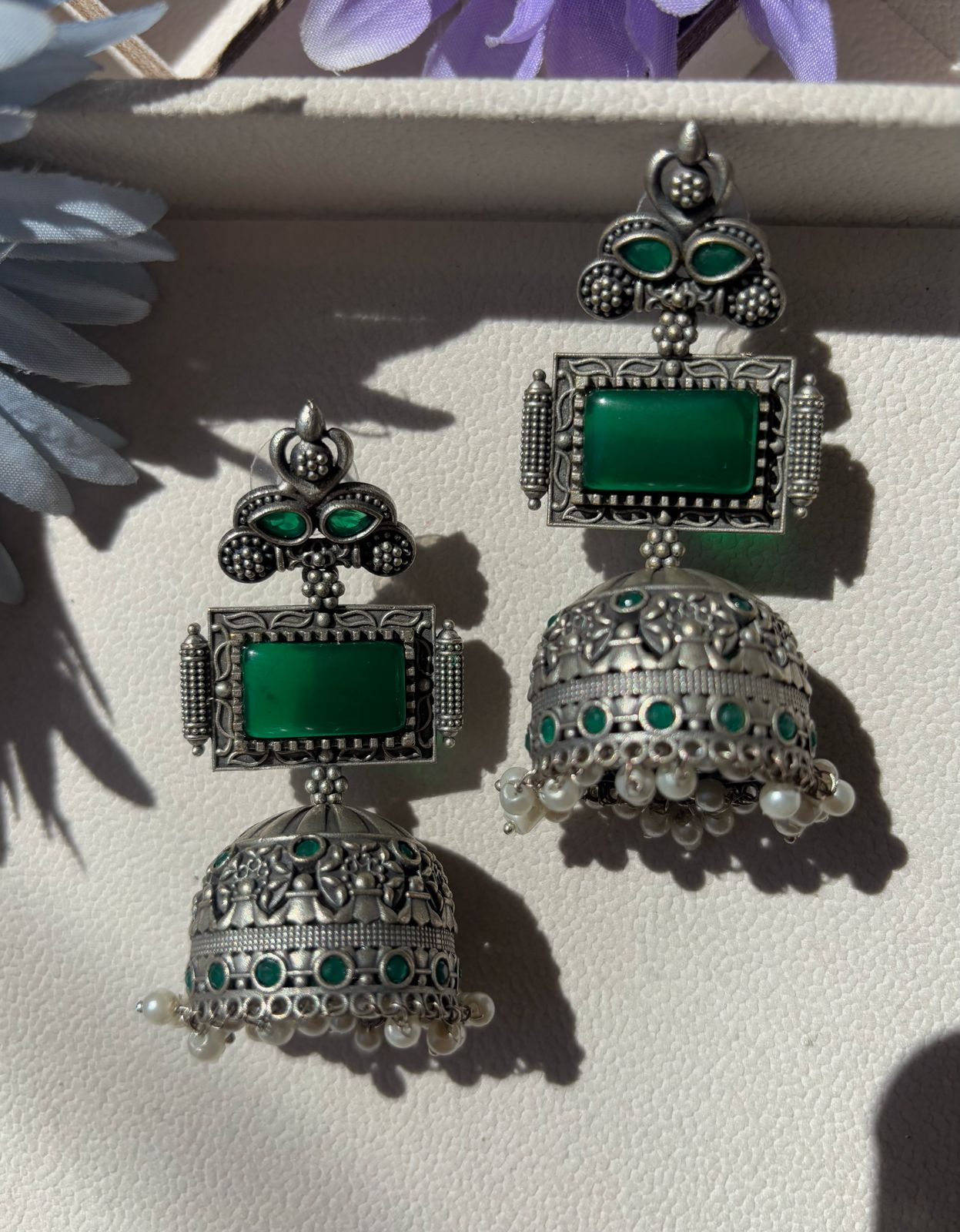 Oxidized German silver long earrings with emerald green stone