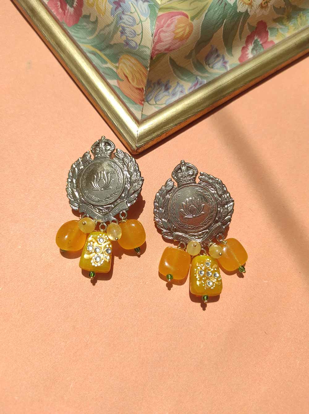 Antique gold polish lotus earrings with lemon hanging