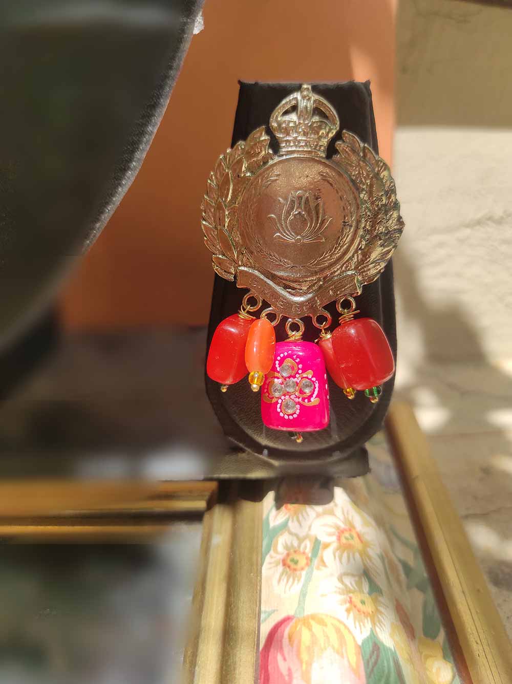 Antique gold polish lotus earrings with pink and orange stone